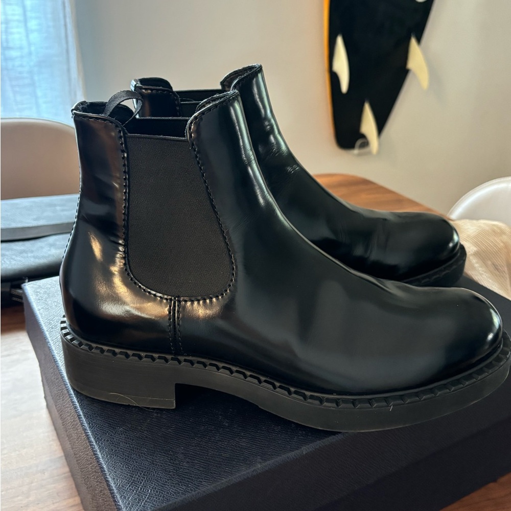 NWT never worn Prada Chelsea boots for men. Size 9.5. Dust bag comes with